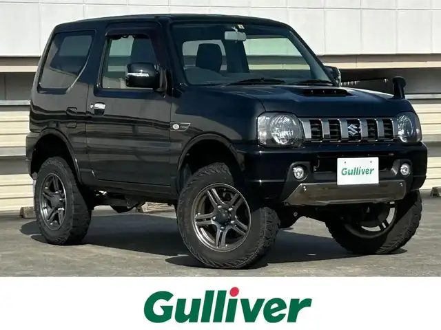スズキ ジムニー ランドベンチャー 静岡県 2018(平30)年 4.8万km ブルーイッシュブラックパール3 ターボ車/５速ＭＴ/４ＷＤ/ストラーダナビ/ＣＤ再生/ワンセグＴＶ/シートヒーター/キーレス/車高調＆リフトアップ/社外マフラー/社外テールランプ/合皮シート/ＬＥＤヘッド/フォグライト/純正１６ＡＷ