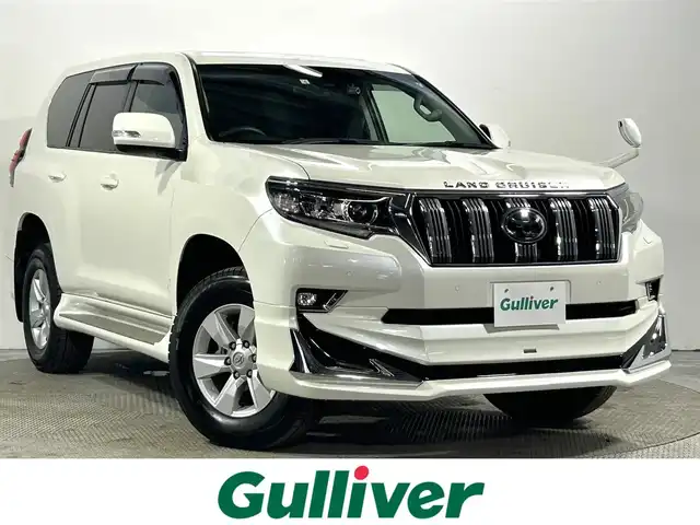 トヨタ ランドクルーザー プラド TX 大阪府 2022(令4)年 1.2万km ホワイトパールクリスタルシャイン サンルーフ モデリスタエアロ 社外ディスプレイオーディオ バックカメラ ETC 衝突軽減 レーダークルコン クリアランスソナー トヨタセーフティセンス ドラレコ ワンオーナー ４WD