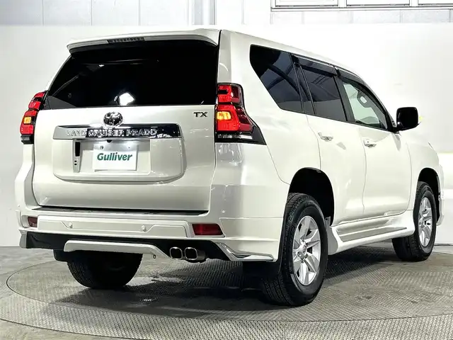 トヨタ ランドクルーザー プラド TX 大阪府 2022(令4)年 1.2万km ホワイトパールクリスタルシャイン サンルーフ モデリスタエアロ 社外ディスプレイオーディオ バックカメラ ETC 衝突軽減 レーダークルコン クリアランスソナー トヨタセーフティセンス ドラレコ ワンオーナー ４WD