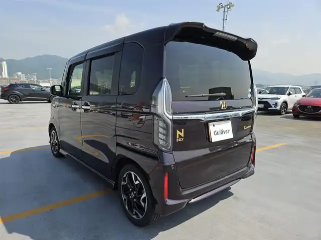 ホンダ Ｎ ＢＯＸ カスタム G L ターボ ホンダセンシング 福岡県 2018(平30)年 4.8万km プレミアムベルベットパープル・パール ワンオーナー/純正ナビ(Bluetooth/CD/DVD)/フルセグTV/両側パワースライドドア/バックカメラ/ビルトインETC/ドライブレコーダー/アダプティブクルーズコントロール/ソナーセンサー/ホンダセンシング/・衝突軽減ブレーキ/・前後誤発進抑制機能/・歩行者事故低減ステアリング/・先行車発進お知らせ機能/・車線維持支援システム/・オートハイビーム/・標識認識機能/ターボ/LEDヘッドランプ/本革巻きステアリング/パドルシフト/ブラック合皮/トリコットコンビシート/チップアップ機能/純正15インチアルミホイール/スマートキーシステム/プッシュエンジンスタート/禁煙車