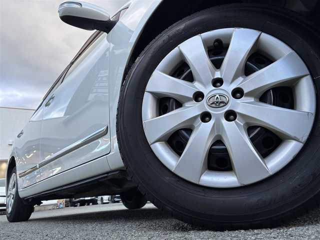 トヨタ プレミオ 1．5F Lパケ プライムグリーン 熊本県 2012(平24)年 10.1万km ホワイトパールクリスタルシャイン １オーナー/社外オーディオ/【AM/FM/USB/AUX/CD】/ウッドコンビステアリング/オートライト/ＨＩＤヘッドライト/フォグランプ/電格ミラー/スマートキー/プッシュスタート/純正フロアマット/純正ドアバイザー/純正ホイールキャップ/取扱説明書/保証書