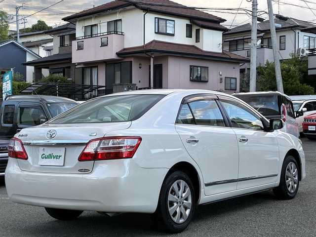 トヨタ プレミオ 1．5F Lパケ プライムグリーン 熊本県 2012(平24)年 10.1万km ホワイトパールクリスタルシャイン １オーナー/社外オーディオ/【AM/FM/USB/AUX/CD】/ウッドコンビステアリング/オートライト/ＨＩＤヘッドライト/フォグランプ/電格ミラー/スマートキー/プッシュスタート/純正フロアマット/純正ドアバイザー/純正ホイールキャップ/取扱説明書/保証書