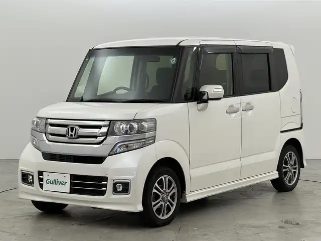 ホンダ Ｎ ＢＯＸ カスタム SSパッケージ 福岡県 2017(平29)年 3.6万km プレミアムホワイトパールⅡ 純正ＳＤナビ（フルセグＴＶ）　/バックカメラ　/ビルトインＥＴＣ　/横滑り防止装置　/両側電動スライドドア　/前席シートヒーター　/プッシュスタート　/オートライト　/電動格納式ドアミラー　/純正１４インチＡＷ