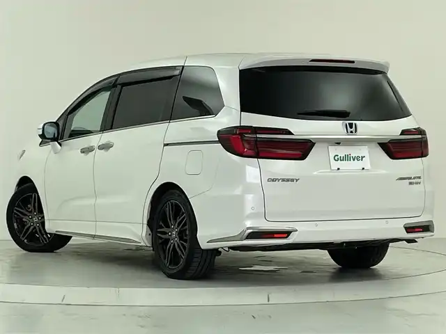 ホンダ オデッセイ ハイブリッド e:HEVアブソルート EX 大阪府 2021(令3)年 6.2万km プラチナホワイトパール ホンダセンシング/　・衝突軽減ブレーキ/　・渋滞追従機能付アダプティブクルーズコントロール/　・路外逸脱抑制機能/　・誤発進抑制機能/　・先行車発進お知らせ機能/　・クリアランスソナー/純正10インチSDナビ[VXU-217DYi]/　CD/DVD/Bluetooth/フルセグ/マルチビューカメラ/バックカメラ/ハンズフリーアクセスパワーバックドア/ジェスチャーコントロール両側パワースライドドア/LEDヘッドライト/オートライト/フォグランプ/LEDアクティブコーナリングライト/ハーフレザー/シートヒーター/パワーシート/純正18インチアルミホイール/スマートキー/ETC2.0