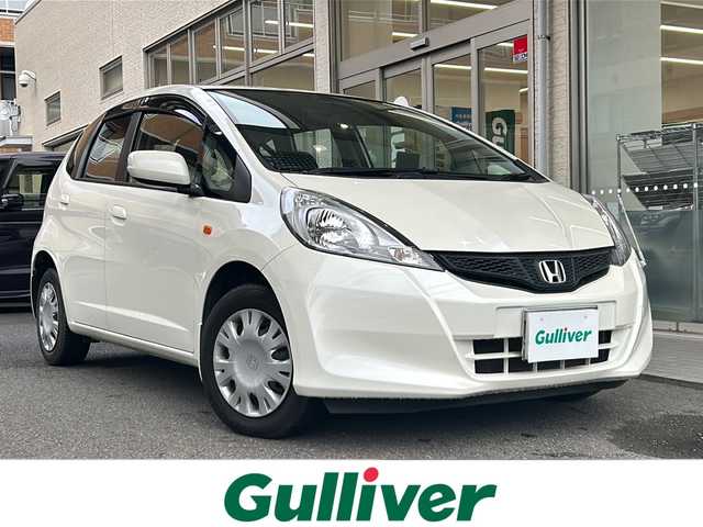 ホンダ フィット 13G 高知県 2013(平25)年 6.2万km プレミアムホワイトパール 純正オーディオ/ポータブルナビ/スペアキー