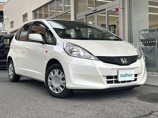 ホンダ フィット 13G 高知県 2013(平25)年 6.2万km プレミアムホワイトパール 純正オーディオ/ポータブルナビ/スペアキー
