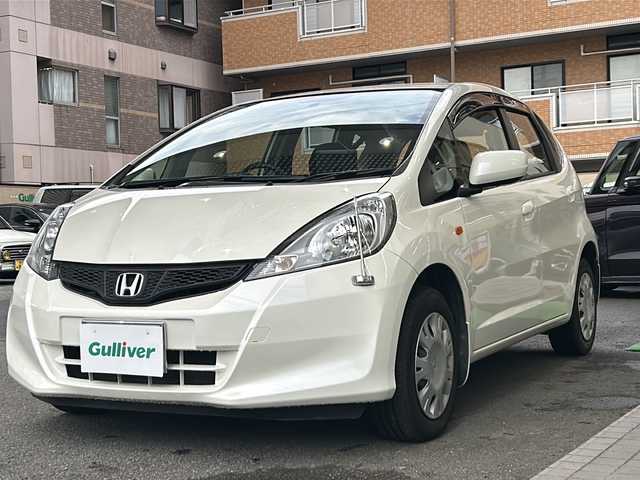 ホンダ フィット 13G 高知県 2013(平25)年 6.2万km プレミアムホワイトパール 純正オーディオ/ポータブルナビ/スペアキー