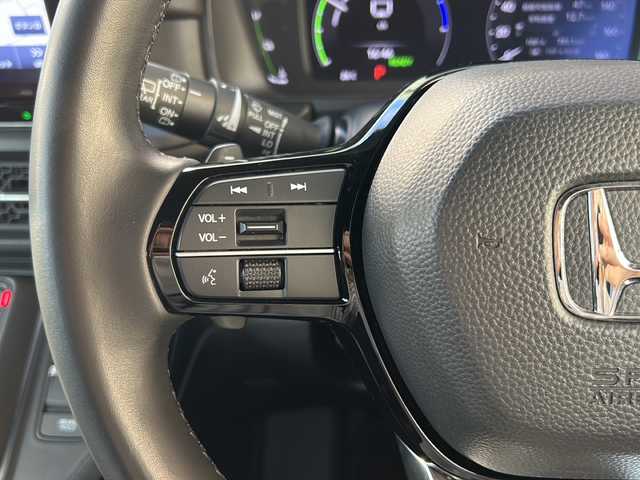 ホンダ ステップワゴン スパーダ eHEV 広島県 2022(令4)年 5.8万km クリスタルブラックパール 禁煙/ホンダセンシング/・衝突軽減/（CMBS）/・誤発進抑制機能●後方誤発進抑制機能/・近距離衝突軽減ブレーキ/・歩行者事故低減ステアリング/・路外逸脱抑制機能/・ACC）/・車線維持支援（LKAS）/・トラフィックジャムアシスト（渋滞運転支援機能）/・先行車発進お知らせ機能/・標識認識機能/・オートハイビーム/・アダプティブドライビングビーム/ブラインドスポットインフォメーション/コーナーセンサー/純正11.4型ナビ（LXM-237VFNi）/・フルセグ/CD/DVD/SD/スマホ連動/Bluetooth/CD録音/純正15.6型フリップダウンモニター（VM-231FE）/LEDアクティブコーナリングライト/シーケンシャルターンランプ/オートライト/電動パーキング/ブレーキホールド/トリプルゾーンエアコン/コンビシート/ロールサンシェード/2列目キャプテンシート/オットマン/パワーテールゲート/減速セレクター/前後ドライブレコーダー（ZDR043）/ETC/ドアバイザー/フロアマット/純正16インチアルミホイール/W+サイド+カーテンエアバック
