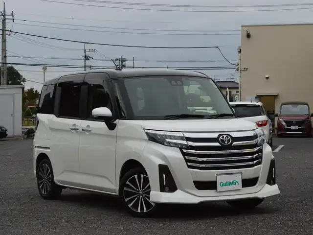 トヨタ ルーミー カスタムG－T 栃木県 2023(令5)年 2.3万km ブラックマイカメタリック/パールホワイト2トーン ワンオーナー/ディーラー点検記録簿/[R7]/スマートアシスト/[衝突警報・衝突回避支援ブレーキ機能・ブレーキ制御付き誤発進抑制機能・先行車発進告知機能・標識認識機能・車線逸脱警報・路側逸脱警報機能・ふらつき警報]/プリクラッシュセーフティ/アダプティブクルーズコントロール/コーナーセンサー/マルチインフォメーションディスプレイ/純正SDナビゲーションシステム/[フルセグ/AM/FM/CD/DVD/BT]/オートライト/LEDヘッドライト/フォグランプ/プッシュスタート/アイドリングストップ/ドライブレコーダー[前後]/電動パーキング/電動格納ミラー/ETC/ステアリングスイッチ/ドアバイザー/純正マット/スマートスペアキー×1/取扱説明書/保証書