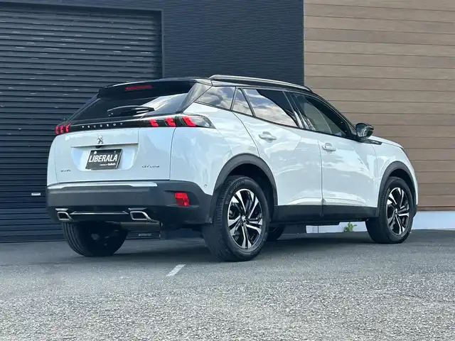 プジョー ２００８ GTライン 宮崎県 2020(令2)年 2.2万km BLANC NACRE 純正ディスプレイオーディオ/・USB/・Bluetooth/・CarPlay/・AM/FM/LEDライト/・ブラインドスポットモニター/・アダプティブクルーズコントロール/・インテリジェントハイビーム/・オートライト/・ディレクショナルヘッドランプ/・レーンキープアシスト/ブラックハーフレザーシート/・DN席シートヒーター/パノラミックサンルーフ/前後ドライブレコーダー/バックカメラ/ETC/スマートキー/プッシュスタート
