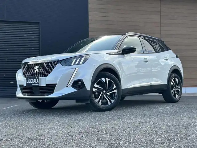 プジョー ２００８ GTライン 宮崎県 2020(令2)年 2.2万km BLANC NACRE 純正ディスプレイオーディオ/・USB/・Bluetooth/・CarPlay/・AM/FM/LEDライト/・ブラインドスポットモニター/・アダプティブクルーズコントロール/・インテリジェントハイビーム/・オートライト/・ディレクショナルヘッドランプ/・レーンキープアシスト/ブラックハーフレザーシート/・DN席シートヒーター/パノラミックサンルーフ/前後ドライブレコーダー/バックカメラ/ETC/スマートキー/プッシュスタート