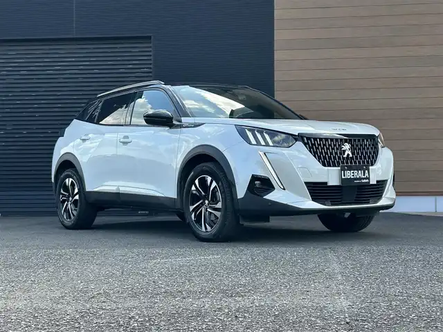 プジョー ２００８ GTライン 宮崎県 2020(令2)年 2.2万km BLANC NACRE 純正ディスプレイオーディオ/・USB/・Bluetooth/・CarPlay/・AM/FM/LEDライト/・ブラインドスポットモニター/・アダプティブクルーズコントロール/・インテリジェントハイビーム/・オートライト/・ディレクショナルヘッドランプ/・レーンキープアシスト/ブラックハーフレザーシート/・DN席シートヒーター/パノラミックサンルーフ/前後ドライブレコーダー/バックカメラ/ETC/スマートキー/プッシュスタート