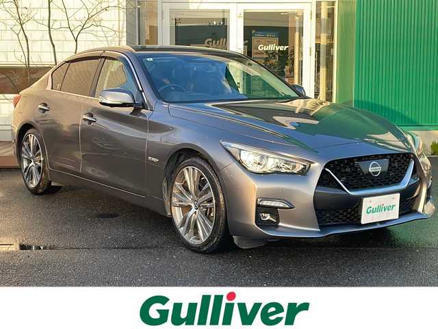 日産 スカイライン ハイブリッド GT タイプSP 青森県 2021(令3)年 9.8万km ダークメタルグレー 4WD/純正メモリナビ・フルセグTV/CD・DVD・Bluetooth・USB・AUX/アラウンドビューモニター/黒レザーシート/前席パワーシート・ヒーター/プロパイロット2.0/エマージェンシーブレーキ/追従クルーズコントロール/ハイビームアシスト/レーンキープアシスト/フロント・バックソナー/ヘッドアップディスプレイ/サイド・カーテンエアバッグ/パドルシフト/純正ビルトインETC2.0/純正エンジンスターター/純正ドライブレコーダー/LEDヘッドライト/LEDフォグランプ/純正19インチアルミ