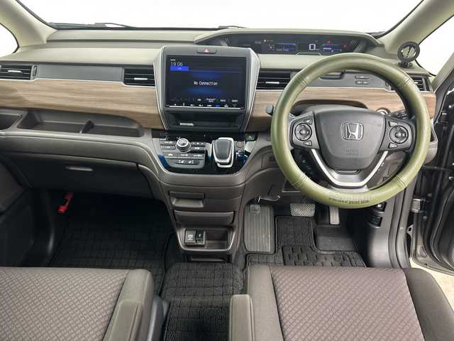 ホンダ フリード ハイブリット G ホンダセンシング 鹿児島県 2020(令2)年 5万km スーパープラチナグレーメタリック 純正9インチナビ/（AM/FM/CD/DVD/Bluetooth/フルセグ）/バックカメラ/ホンダセンシング/・衝突軽減ブレーキ/・レーンキープアシスト/・追従式クルーズコントロール/・クリアランスソナー/・オートマチックハイビーム/・先行者発信お知せ機能/ETC/前席シートヒーター/キャプテンシート/両側パワースライドドア/スマートキー/スペアキー有/純正15インチアルミホイール/純正フロアマット/横滑り防止装置/アイドリングストップ