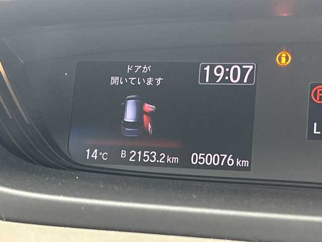 ホンダ フリード ハイブリット G ホンダセンシング 鹿児島県 2020(令2)年 5万km スーパープラチナグレーメタリック 純正9インチナビ/（AM/FM/CD/DVD/Bluetooth/フルセグ）/バックカメラ/ホンダセンシング/・衝突軽減ブレーキ/・レーンキープアシスト/・追従式クルーズコントロール/・クリアランスソナー/・オートマチックハイビーム/・先行者発信お知せ機能/ETC/前席シートヒーター/キャプテンシート/両側パワースライドドア/スマートキー/スペアキー有/純正15インチアルミホイール/純正フロアマット/横滑り防止装置/アイドリングストップ