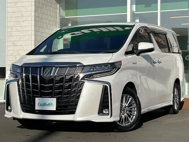 トヨタ アルファードハイブリット S タイプゴールド 道央・札幌 2020(令2)年 4.5万km ホワイトパールクリスタルシャイン ・４WD/・衝突軽減ブレーキ/・サンルーフ/・両側パワースライドドア/・パワーバックドア/・ハーフレザーシート/・純正ナビ/　CD＆DVD＆BT＆TV/・全方位カメラ/・バックカメラ/・フリップダウンモニター/・パーキングアシスト/・コーナーセンサー/・レーンキープアシスト/・レーダークルーズコントール/・オートエアコン/・オートライト/・オートリトラミラー/・JBLプレミアムサウンド/・プッシュスタート/・スマートキー/・ビルトインETC/・MT付きAT/・ブラインドスポットモニター/・オートハイビーム/・純正フロアマット/・ウィンカーミラー/・ドアバイザー/・フォグライト
