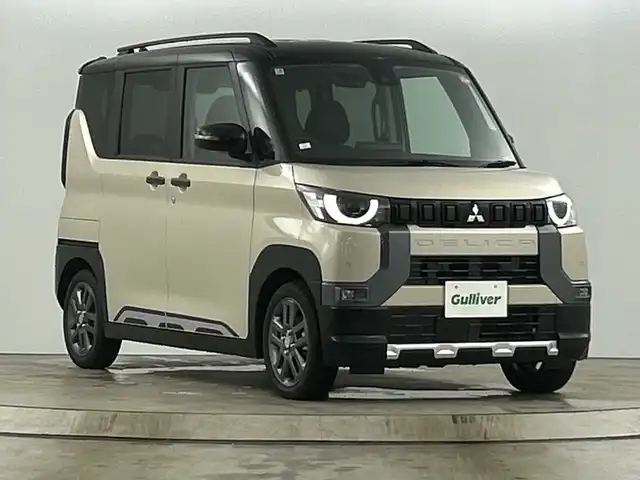 三菱 デリカミニ T プレミアム 愛知県 2025(令7)年 0.1万km未満 ベージュⅡ 純正9型ディスプレイオーディオ/・VTR USB HDMI BT Apple CarPlay Android Auto/マイパイロット/・追従型クルーズコントロール/・車線維持機能/前席シートヒーター/ステアリングヒーター/撥水シート/両側パワースライドドア/デジタルインナーミラー/全方位モニター/電動パーキングブレーキ/オートブレーキホールド/パドルシフト/リヤサーキュレーター(プラズマクラスター)/リアサンシェード/純正15インチアルミホイール/サイドデカール/電動格納ミラー/ウィンカーミラー/LEDヘッドライト