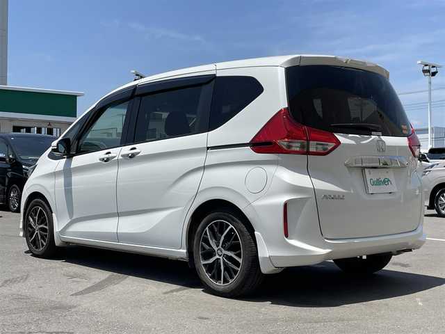 ホンダ フリード G ホンダセンシング 東京都 2018(平30)年 8.8万km ホワイトオーキッドパール カロッツェリアナビ/バックモニター/天吊モニター/衝突軽減ブレーキ/路外逸脱抑制機能/車線維持支援/アダプティブクルーズコントロール/両側パワースライドドア/ＥＴＣ/ドライブレコーダー/スマートキー