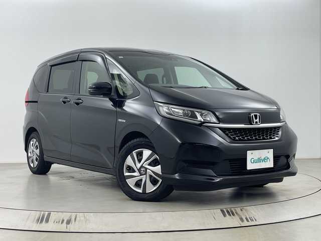 ホンダ フリード ハイブリット G ホンダセンシング 埼玉県 2019(令1)年 2.6万km クリスタルブラックパール 純正ナビ　VXM-204VFi/(Bluetooth/CD/DVD/USB/AM/FM)/地デジフルセグ/バックカメラ/前後ドライブレコーダー/ETC/アダプティブクルーズコントロール/車線逸脱警報/衝突軽減ブレーキ/先行車発進お知らせ機能/標識認識機能/運転席・助手席シートヒーター/ロールサンシェード/両側パワースライドドア/プッシュスタート/ステアリングリモコン/ウィンカーミラー/純正フロアマット/純正ドアバイザー