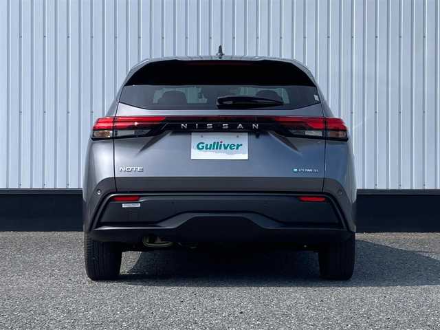 日産 ノート X 愛媛県 2022(令4)年 1.2万km ダークメタルグレー 純正9インチメモリナビ/(CD/DVD/BT/フルセグTV)/衝突被害軽減システム/車線逸脱警報/横滑り防止装置/ETC/ドライブレコーダー/オートライト/ウィンカーミラー/電動格納ミラー/プッシュスタート/スマートキー/フロアマット/ドアバイザー/取扱説明書