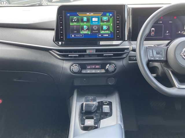 日産 ノート X 愛媛県 2022(令4)年 1.2万km ダークメタルグレー 純正9インチメモリナビ/(CD/DVD/BT/フルセグTV)/衝突被害軽減システム/車線逸脱警報/横滑り防止装置/ETC/ドライブレコーダー/オートライト/ウィンカーミラー/電動格納ミラー/プッシュスタート/スマートキー/フロアマット/ドアバイザー/取扱説明書