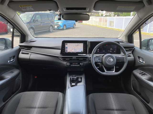 日産 ノート X 愛媛県 2022(令4)年 1.2万km ダークメタルグレー 純正9インチメモリナビ/(CD/DVD/BT/フルセグTV)/衝突被害軽減システム/車線逸脱警報/横滑り防止装置/ETC/ドライブレコーダー/オートライト/ウィンカーミラー/電動格納ミラー/プッシュスタート/スマートキー/フロアマット/ドアバイザー/取扱説明書