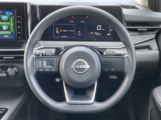 日産 ノート X 愛媛県 2022(令4)年 1.2万km ダークメタルグレー 純正9インチメモリナビ/(CD/DVD/BT/フルセグTV)/衝突被害軽減システム/車線逸脱警報/横滑り防止装置/ETC/ドライブレコーダー/オートライト/ウィンカーミラー/電動格納ミラー/プッシュスタート/スマートキー/フロアマット/ドアバイザー/取扱説明書