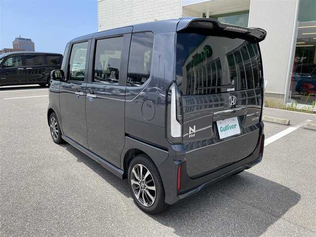 ホンダ Ｎ ＢＯＸ カスタム 石川県 2024(令6)年 0.1万km メテオロイドグレーメタリック 純正9型ナビ/フルセグTV/バックカメラ/LEDヘッドライト/ビルトインETC/ドライブレコーダー/シートヒーター/パワースライドドア/ホンダセンシング/レーダークルーズ/純正アルミホイール/レーンキープ/スマートキー/プッシュスタート/保証書