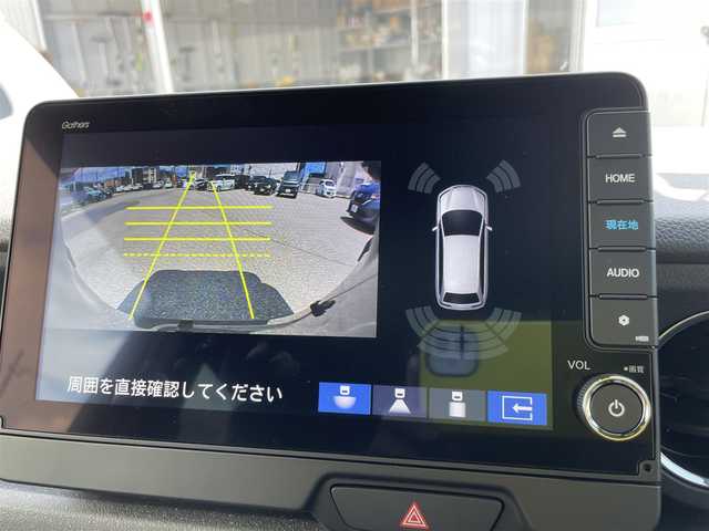 ホンダ Ｎ ＢＯＸ カスタム 石川県 2024(令6)年 0.1万km メテオロイドグレーメタリック 純正9型ナビ/フルセグTV/バックカメラ/LEDヘッドライト/ビルトインETC/ドライブレコーダー/シートヒーター/パワースライドドア/ホンダセンシング/レーダークルーズ/純正アルミホイール/レーンキープ/スマートキー/プッシュスタート/保証書
