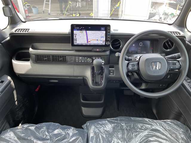 ホンダ Ｎ ＢＯＸ カスタム 石川県 2024(令6)年 0.1万km メテオロイドグレーメタリック 純正9型ナビ/フルセグTV/バックカメラ/LEDヘッドライト/ビルトインETC/ドライブレコーダー/シートヒーター/パワースライドドア/ホンダセンシング/レーダークルーズ/純正アルミホイール/レーンキープ/スマートキー/プッシュスタート/保証書