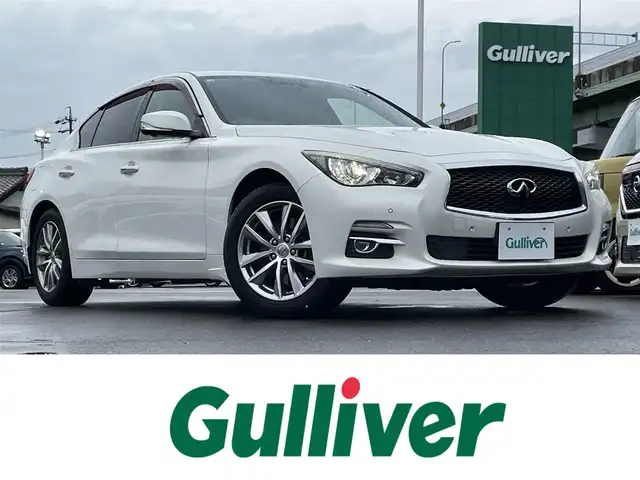 日産 スカイライン 200GT－t タイプP 愛知県 2014(平26)年 9.2万km パール 純正ナビ/・Bluetooth/・FM/AM/・TVフルセグ/・CD/・iPod/・AUX/DCA/LDP/BSI/エマージェンシーブレーキ/レーダークルーズコントロール/アラウンドビューモニター/ステアリングスイッチ/アイドリングストップ/パワーシート/シートヒーター/LEDライト/純正17インチAW/純正フロアマット/ドアバイザー