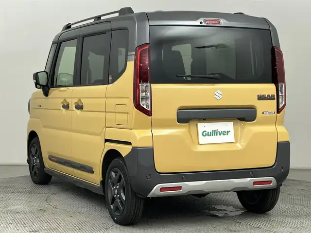スズキ スペーシア ギア HYBRID XZターボ 道央・札幌 2024(令6)年 0.2万km 黄Ⅱ ・４WD/・純正メモリーナビゲーション/　BT/USB/フルセグ/iPod/HDMI/・全方位カメラ/・ヘッドアップディスプレイ/・両側パワースライドドア/・レーダークルーズコントロール/・レーンキープアシスト/・衝突軽減ブレーキ/・横滑り防止装置/・前席シートヒーター/・ステアリングヒーター/・オートライト/・LEDヘッドライト/・フロントフォグランプ/・前後コーナーセンサー/・パドルシフト/・スマートキー/・プッシュスタート/・純正フロアマット/・純正ＡＷ14インチ/・ヘッドライトレベライザー/・シーバックテーブル/・ルーフファン