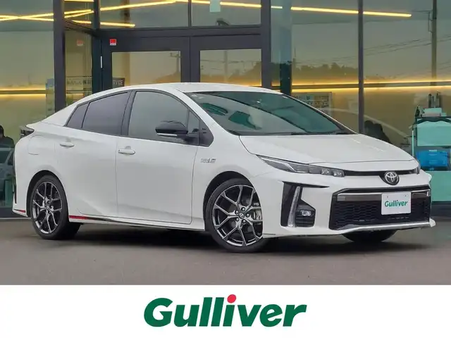 トヨタ プリウス ＰＨＶ Sナビパッケージ・GRスポーツ 東京都 2019(令1)年 2万km ホワイトパールクリスタルシャイン Toyota Safety Sense P/・プリクラッシュセーフティシステム/・レーンディパーチャーアラート/・アダプティブハイビームシステム/・レーダークルーズコントロール/純正11.6インチナビ/(フルセグTV/BT/iPod/USB/AUX/AM/FM)/バックカメラ/ビルトインETC2.0/前後ドライブレコーダー/ハーフレザーシート/シートヒーター/LEDヘッドライト/フォグランプ/純正18インチアルミホイール/純正フロアマット/スマートキー/プッシュスタート