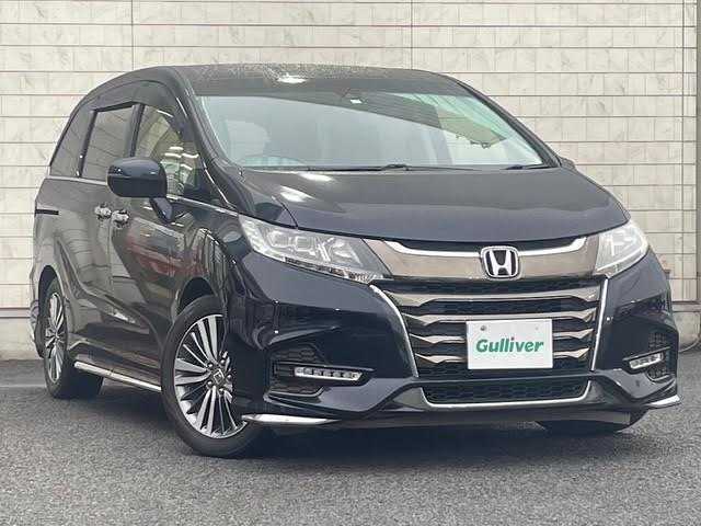 ホンダ オデッセイ アブソルート ホンダセンシング 大分県 2020(令2)年 5.4万km プレミアムヴィーナスブラックP ワンオーナー/純正メモリーナビ/CD/DVD/BT/HDMI/フルセグTV/バックカメラ/ホンダセンシング/レーダークルーズコントロール/レーンキープアシスト/両側パワースライドドア/革調シートカバー/D席パワーシート/ナビ連動純正ドライブレコーダー前後/ステアリングスイッチ/パドルシフト/LEDヘッドライト/室内灯LED/ビルトインETC2.0/保証書/取扱説明書