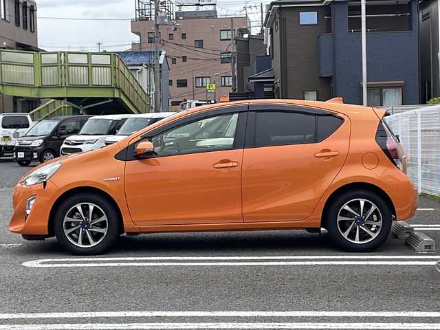 トヨタ アクア S 兵庫県 2017(平29)年 3万km オレンジパールクリスタルシャイン 登録時走行距離29916km/モデリスタ15インチAW/アルパインナビ/フルセグTV/Bluetooth/バックカメラ/前後ドライブレコーダー/スマートエントリーパッケージ/スマートエントリー/スタートシステム、イモビライザー、オートライト/LEDヘッドランプパッケージ/ブラック加飾付LEDヘッドランプパッケージ/LEDフロントフォグランプ/ETC/取扱説明書・保証書