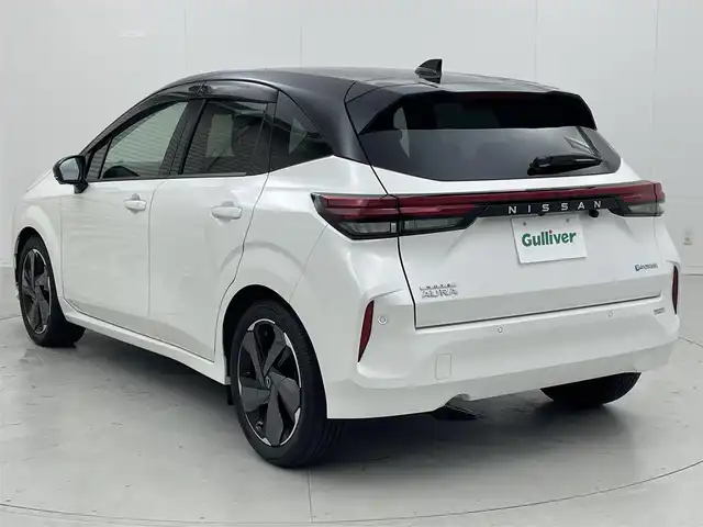 日産 オーラ G レザーエディション 茨城県 2022(令4)年 0.1万km ピュアホワイトパール / スーパーブラック 2トーン 純正9型ナビ/全方位カメラ/フルセグ/BOSEパーソナルプラスサウンドシステム/置くだけ充電/プロパイロット/衝突被害軽減ブレーキ/車線逸脱抑制装置/オートマチックハイビーム/ソナー/BSW/デジタルインナーミラー/ETC2.0/ドラレコ/純正17インチAW/LEDヘッドライト/スマートキー