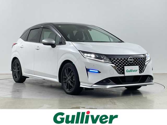 日産 ノート オーテック FOUR 道央・札幌 2021(令3)年 5.2万km ピュアホワイトパール / スーパーブラック 2トーン ・４WD/・インテリジェント エマージェンシーブレーキ:/・踏み間違い衝突防止アシスト/車線逸脱警報 (LDW):/・ハイビームとロービーム/・全方位運転支援システム:/・純正ナビ/・Bluetooth/CD/DVD/SD/フルセグTV/・レザーシート/・前席シートヒーター/ステアリングヒーター/・LEDヘッドライト/オートライト/・スマートキー/スペアキー１本/・横滑り防止装置/・盗難防止装置/・ABS/・ETC/・純正ドライブレコーダー/・積込サマータイヤ純正AW付