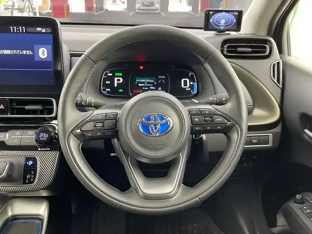 トヨタ アクア Z 愛知県 2022(令4)年 2.4万km シルバーオパールM 禁煙車/純正10.5インチナビ/（AM/FM/Bluetooth/USB)/バックカメラ/AC100V電源/トヨタセーフティセンス/・プリクラッシュセーフティ/・レーダークルーズコントロール/・レーンディパーチャーアラート/・オートマチックハイビーム/・誤発進抑制機能/・ふらつき警報機能/ETC/前後ドライブレコーダー/パワーシート/シートヒーター/ハーフレザーシート/フロアマット/純正16インチアルミホイール/オートライト/LEDヘッドライト/フロントフォグランプ/横滑り防止装置