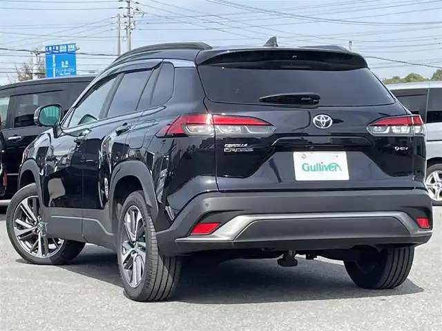 トヨタ カローラ クロス ハイブリッド Z 道央・札幌 2023(令5)年 1.2万km スパークリングブラックパールクリスタルシャイン ４WD/寒冷地仕様/純正ディスプレイオーディオ（ナビ付）/AM/FM/BT/フルセグ/トヨタチームメイト/トヨタセーフティセンス/プリクラッシュセーフティ/横滑り防止装置/レーダークルーズコントロール/レーンキープアシスト/クリアランスソナー/パーキングアシスト/BSM/PDA/PKSB/SEA/RCD/RSA/パノラミックビューモニター/ビルトインETC2.0/EVMODE/DRIVEMODE切替/パワーバックドア/D席パワーシート/前席シートヒーター/ハーフレザーシート/革巻きステアリング/ステアリングリモコン/ハンドルヒーター/AC100V/電動パーキング/ブレーキホールド/プッシュスタート/スマートキー/LEDヘッドライト/オートライト/オートハイビーム/フォグランプ/ヘッドライトレベライザー/電動格納ミラー/ヒーテッドドアミラー/ウィンカーミラー/純正フロアマット/ドアバイザー