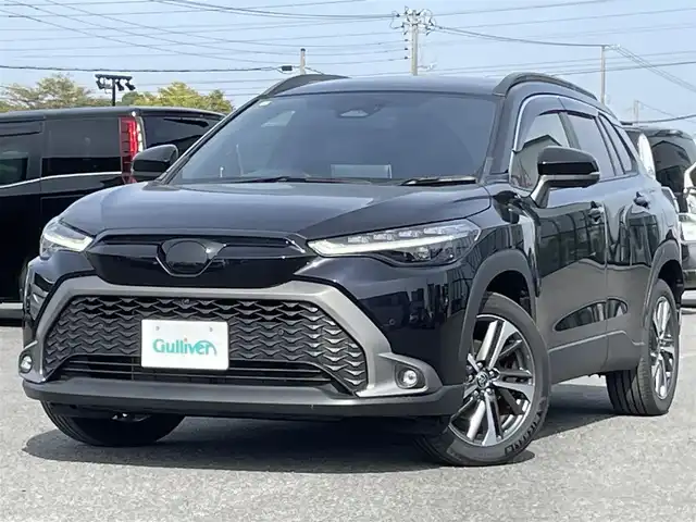 トヨタ カローラ クロス ハイブリッド Z 道央・札幌 2023(令5)年 1.2万km スパークリングブラックパールクリスタルシャイン ４WD/寒冷地仕様/純正ディスプレイオーディオ（ナビ付）/AM/FM/BT/フルセグ/トヨタチームメイト/トヨタセーフティセンス/プリクラッシュセーフティ/横滑り防止装置/レーダークルーズコントロール/レーンキープアシスト/クリアランスソナー/パーキングアシスト/BSM/PDA/PKSB/SEA/RCD/RSA/パノラミックビューモニター/ビルトインETC2.0/EVMODE/DRIVEMODE切替/パワーバックドア/D席パワーシート/前席シートヒーター/ハーフレザーシート/革巻きステアリング/ステアリングリモコン/ハンドルヒーター/AC100V/電動パーキング/ブレーキホールド/プッシュスタート/スマートキー/LEDヘッドライト/オートライト/オートハイビーム/フォグランプ/ヘッドライトレベライザー/電動格納ミラー/ヒーテッドドアミラー/ウィンカーミラー/純正フロアマット/ドアバイザー