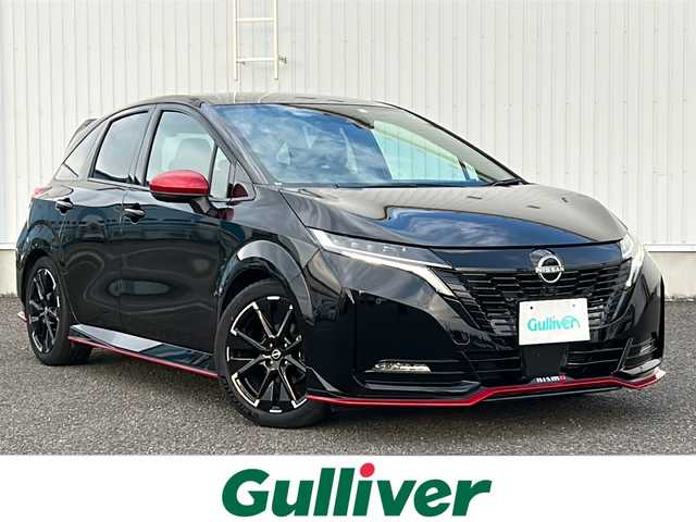 日産 オーラ ニスモ 熊本県 2022(令4)年 2.6万km スーパーブラック 純正ナビ/・AM/FM/BT/USＢ/・アップルカープレイ/アンドロイドオート/アラウンドビューモニター/プロパイロット/エマージェンシーブレーキ/側方支援/後側方支援/駐車支援/ふらつき警報/標識認識機能/デジタルインナーミラー/置くだけ充電/ＥＴＣ２．０　/革巻きステアリング/ステアリングヒーター/ステアリングスイッチ/前席シートヒーター/ドライブレコーダー/電動パーキングブレーキ/オートホールドブレーキ/ＬＥＤヘッドライト/純正フロアマット/純正アルミホイール/電動格納ミラー/ウインカーミラー/プッシュスタート/スペアキー