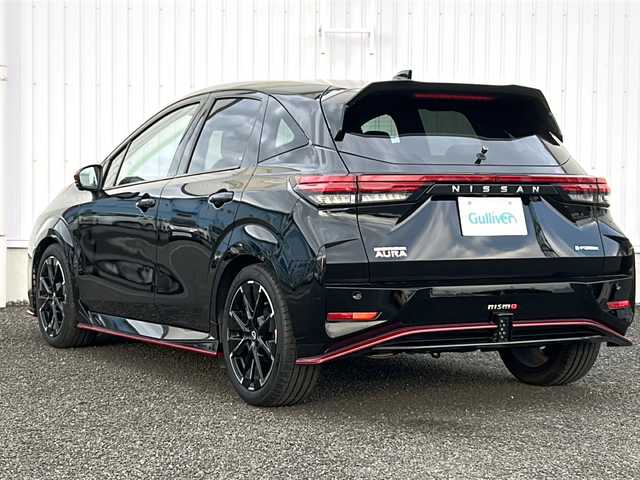 日産 オーラ ニスモ 熊本県 2022(令4)年 2.6万km スーパーブラック 純正ナビ/・AM/FM/BT/USＢ/・アップルカープレイ/アンドロイドオート/アラウンドビューモニター/プロパイロット/エマージェンシーブレーキ/側方支援/後側方支援/駐車支援/ふらつき警報/標識認識機能/デジタルインナーミラー/置くだけ充電/ＥＴＣ２．０　/革巻きステアリング/ステアリングヒーター/ステアリングスイッチ/前席シートヒーター/ドライブレコーダー/電動パーキングブレーキ/オートホールドブレーキ/ＬＥＤヘッドライト/純正フロアマット/純正アルミホイール/電動格納ミラー/ウインカーミラー/プッシュスタート/スペアキー