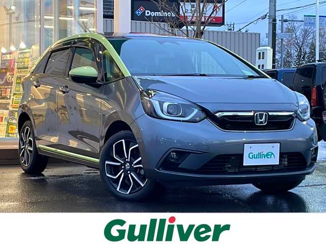 ホンダ フィット ネス 道央・札幌 2020(令2)年 4.6万km シャイニンググレーM ・4WD/・ワンオーナー/・ホンダセンシング/・寒冷地仕様/・純正SDナビ/CD&DVD&BT&USB&フルセグTV/・バックカメラ/・前後コーナーセンサー/・前後クリアランスソナー/・前後ドライブレコーダー/・レーダークルーズコントロール/・ステアリングスイッチ/・ABS/・横滑り防止装置/・レーンキープアシスト/・盗難防止装置/・オートライト/・LEDヘッドライト/・フォグランプ/・ドアバイザー/・電動格納ミラー/・純正フロアマット/・純正AW付夏タイヤ185/55/R16/・積込社外AW付冬タイヤ185/60/R15/・スペアキー1本