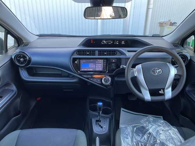 トヨタ アクア S 石川県 2016(平28)年 7.4万km 白 社外メモリーナビ　ワンセグＴＶ　バックカメラ　ＥＴＣ　キーレス　レーダーブレーキ　社外ホイールキャップ　電動ミラー