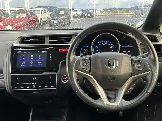 ホンダ フィット ハイブリット Sパッケージ 島根県 2015(平27)年 4.8万km ホワイトオーキッドパール 登録時走行距離47539km/Hondaインターナビ/Bluetooth/AM/FM/CD/DVD/HDMI/フルセグテレビ/バックカメラ/ETC/LEDヘッドライト/フォグランプ/プッシュスタート/スマートキー/あんしんパッケージ/純正フロアマット/純正16インチAW/ウィンカーミラー/ドアバイザー/パドルシフト/禁煙車