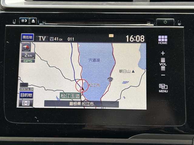 ホンダ フィット ハイブリット Sパッケージ 島根県 2015(平27)年 4.8万km ホワイトオーキッドパール 登録時走行距離47539km/Hondaインターナビ/Bluetooth/AM/FM/CD/DVD/HDMI/フルセグテレビ/バックカメラ/ETC/LEDヘッドライト/フォグランプ/プッシュスタート/スマートキー/あんしんパッケージ/純正フロアマット/純正16インチAW/ウィンカーミラー/ドアバイザー/パドルシフト/禁煙車