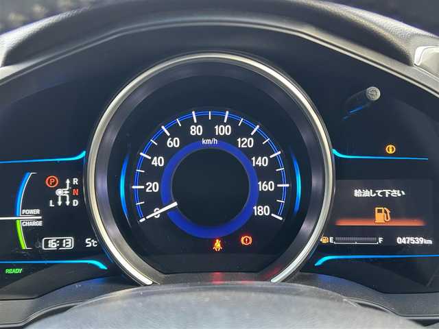 ホンダ フィット ハイブリット Sパッケージ 島根県 2015(平27)年 4.8万km ホワイトオーキッドパール 登録時走行距離47539km/Hondaインターナビ/Bluetooth/AM/FM/CD/DVD/HDMI/フルセグテレビ/バックカメラ/ETC/LEDヘッドライト/フォグランプ/プッシュスタート/スマートキー/あんしんパッケージ/純正フロアマット/純正16インチAW/ウィンカーミラー/ドアバイザー/パドルシフト/禁煙車