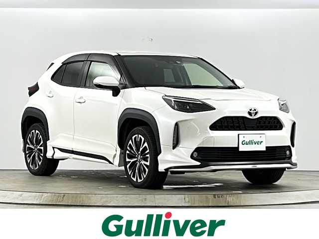 トヨタ ヤリスクロス Z 愛知県 2021(令3)年 2.1万km ホワイトパールクリスタルシャイン 純正8型ナビ/（AM/FM/USB/Bluetooth/Miracast/TV/CarPlay/AndroidAuto）/バックカメラ/モデリスタエアロ（F/S/R下）/ドライブレコーダー 前後/ビルトイン ETC2.0/Toyota Safety Sense/・プリクラッシュセーフティ［PCS］/・レーントレーシングアシスト［LTA］/・【OP】ブラインドスポットモニター［BSM］/・【OP】パーキングサポートブレーキ［PKSB］（後方接近車両）/・レーダークルーズ（全車速追従機能付）/・クリアランスソナー/・ロードサインアシスト［RSA］/・オートハイビーム［AHB］/・先行車発進告知機能［TMN］/装備/・【OP】ハンズフリーパワーバックドア（停止位置メモリー・予約ロック機能付）/・ハーフレザーシート/・シートヒーター（D/N）/・パワーシート（D6way）/・オートライト/・LEDヘッドライト/・LEDフロントフォグライト/・プッシュスタート/・スマートキーシステム/・TVキャンセラー/・電子制御パーキングブレーキ/・オートブレーキホールド機能/・オートエアコン/・純正18inAW/・保/取/マルチ取/ナビ取