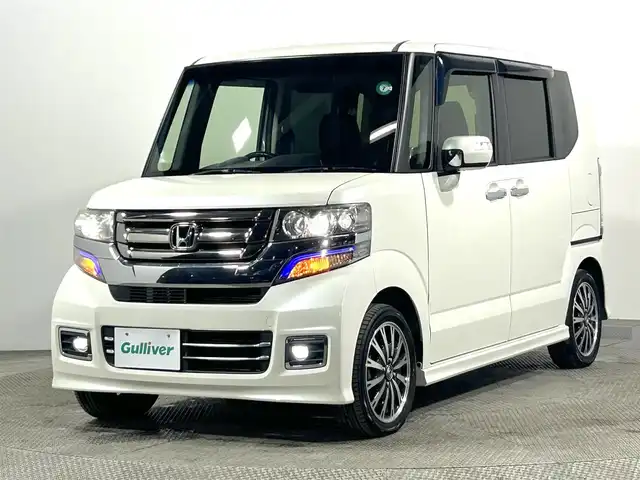 ホンダ Ｎ ＢＯＸ G ターボ Lパッケージ 大阪府 2016(平28)年 5.5万km プレミアムホワイトパールⅡ 純正ナビ(フルセグ/DVD再生/Bluetooth) 後席モニター 両側パワースライドドア バックカメラ ETC クルコン オートライト パドルシフト オートエアコン HIDヘッドライト スマートキー