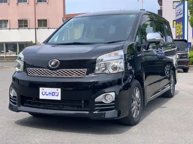 トヨタ ヴォクシー ZS 煌Z 福井県 2013(平25)年 9.7万km ブラック (株)IDOMが運営する【じしゃロン福井店】の自社ローン専用車両になりますこちらは現金またはオートローンご利用時の価格です。自社ローンご希望の方は別途その旨お申付け下さい/純正ナビ/Bluetooth/フルセグTV/CD/DVD/バックカメラ/両側パワースライドドア/オートライト/ETC/ハーフレザーシート/ウォークスルー/純正アルミホイール/純正フロアマット/ドアバイザー/パドルシフト/ステアリングスイッチ/プッシュスタート/スマートキー/スペアキー/取扱説明書、保証書